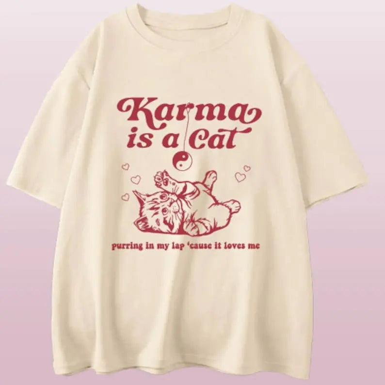 Taylor Swift Karma Is a Cat T-Shirt: Embrace the comfy and fashionable Vibes with this Swiftie Merch shirt. Taylor Swift Eras Tour Shirt Raveloo